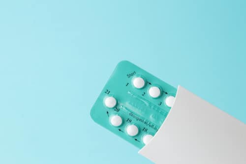 Pack of oral contraceptive pills with instructions.